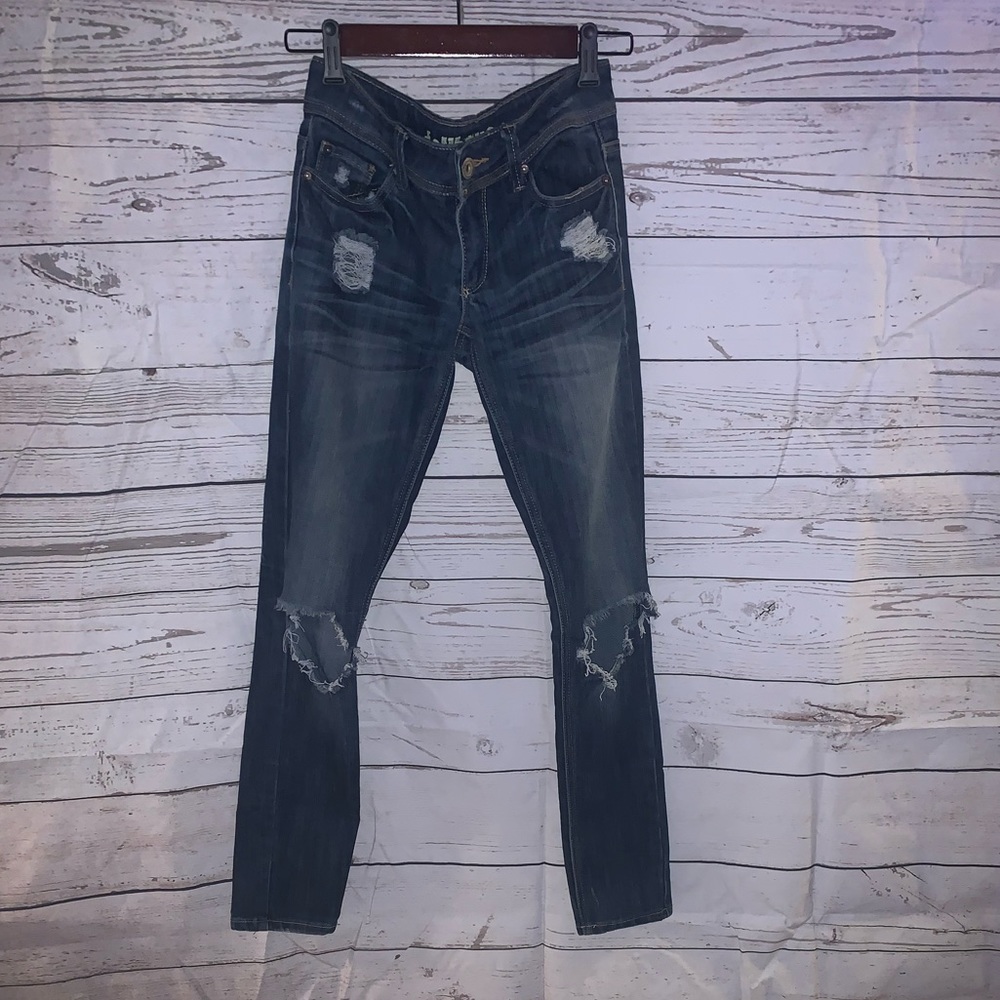 “Busted Knee” Skinny Denim